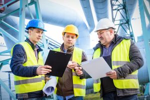 Engineers discussing maintenance